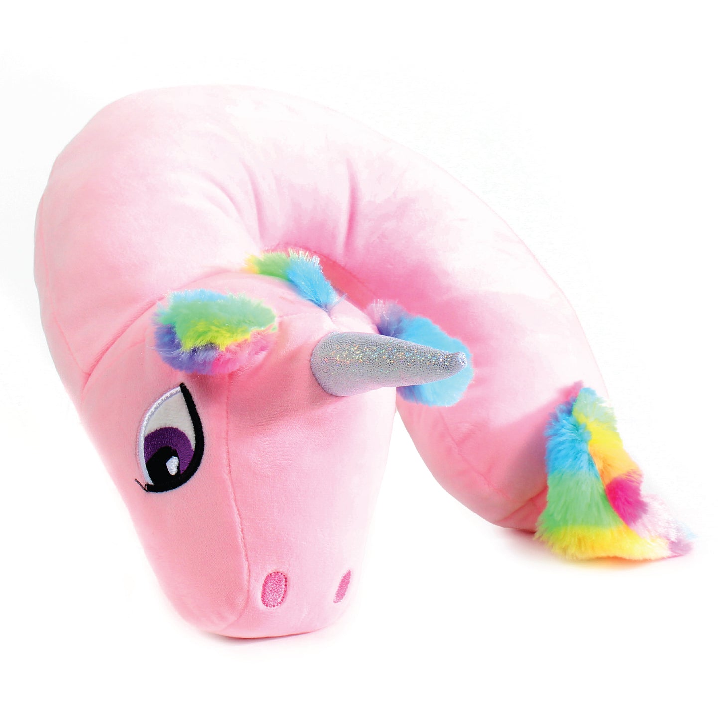 Side view of the Pink Unicorn Kids' Junior Travel Pillow. This travel neck pillow features a pink body with embroidered eyes and furry, rainbow-colored ears, hair, and tail, as well as a shimmery horn.