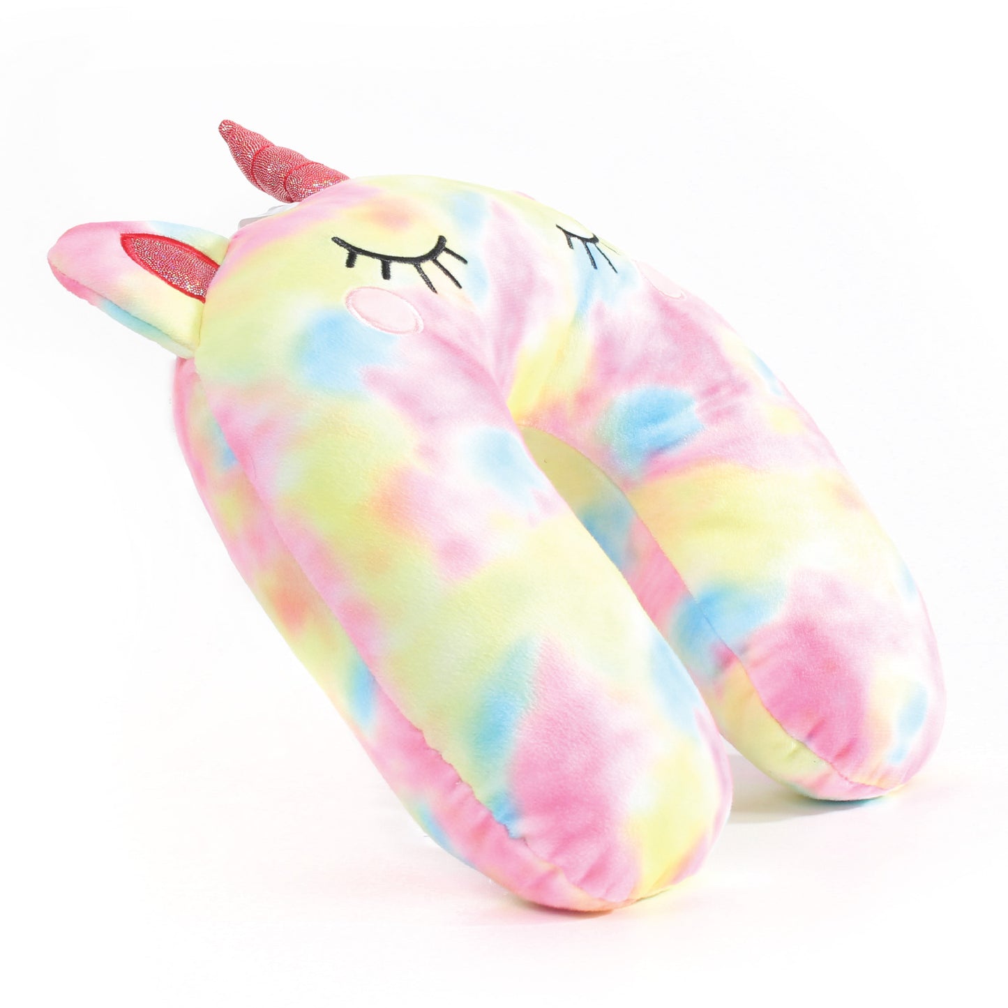 Side view of the Tie Dye Unicorn Kids' Junior Travel Pillow. This travel neck pillow features a tie dye pink/blue/yellow body with a shimmery horn, iridescent ears, and embroidered eyes.