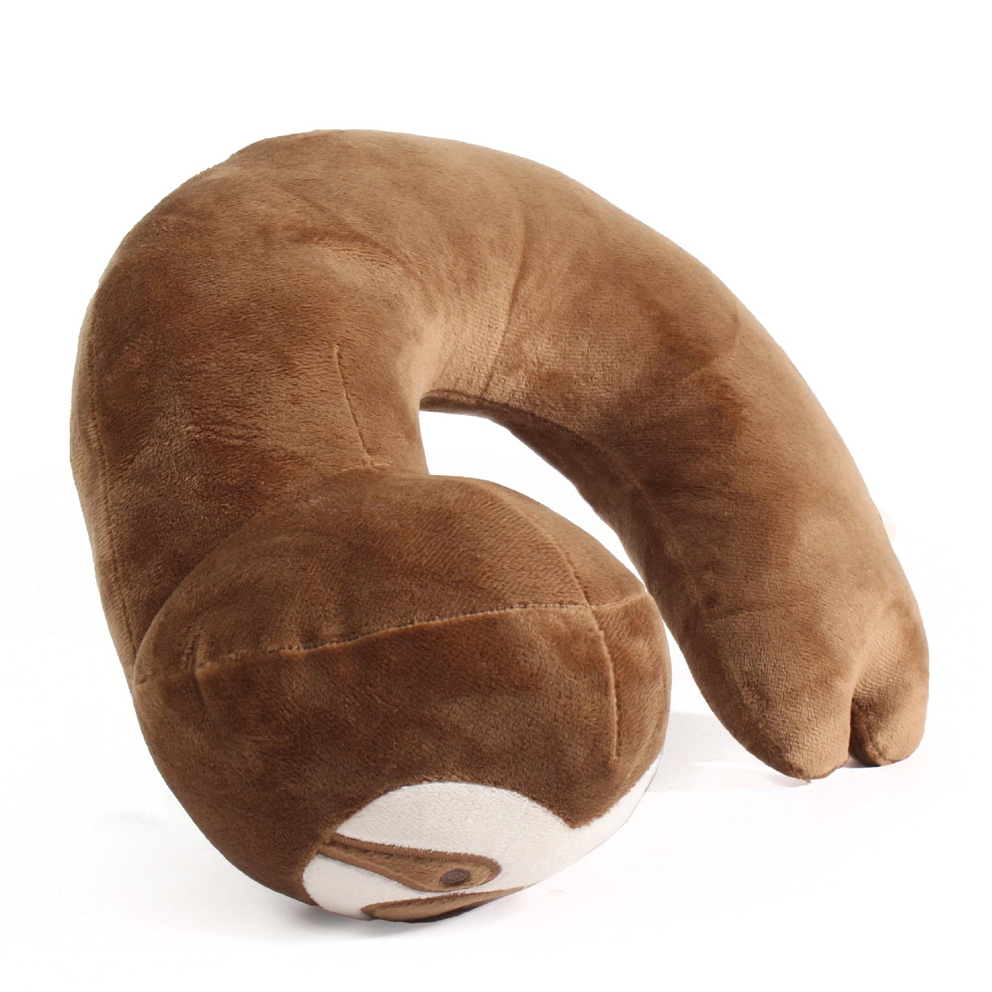 Side view of the Sloth Kids' Junior Travel Pillow. This travel neck pillow features a soft, brown body with embroidered facial features and a short, curled tail.
