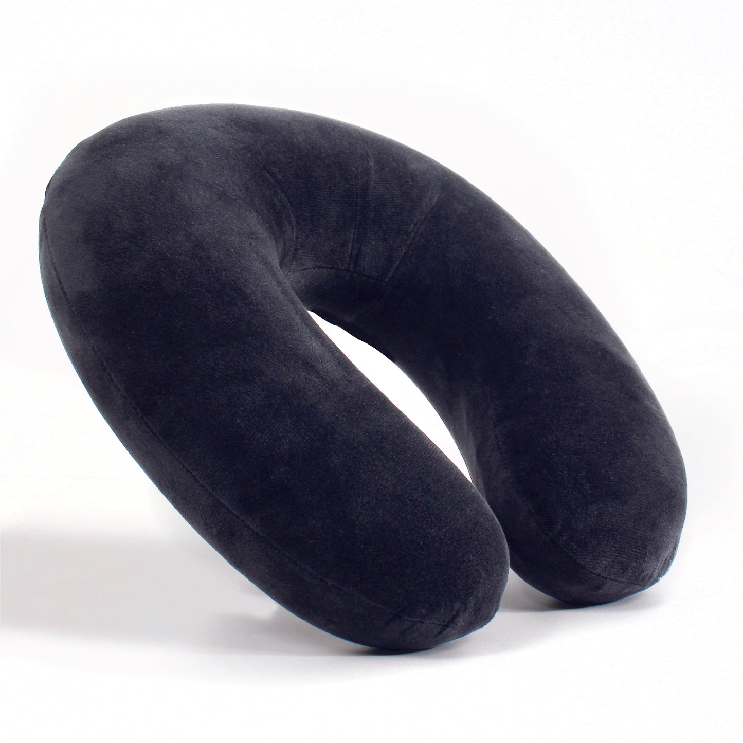 Side view of the Plush Travel Neck Pillow in Black, which is made of ultra-soft dark black fabric.