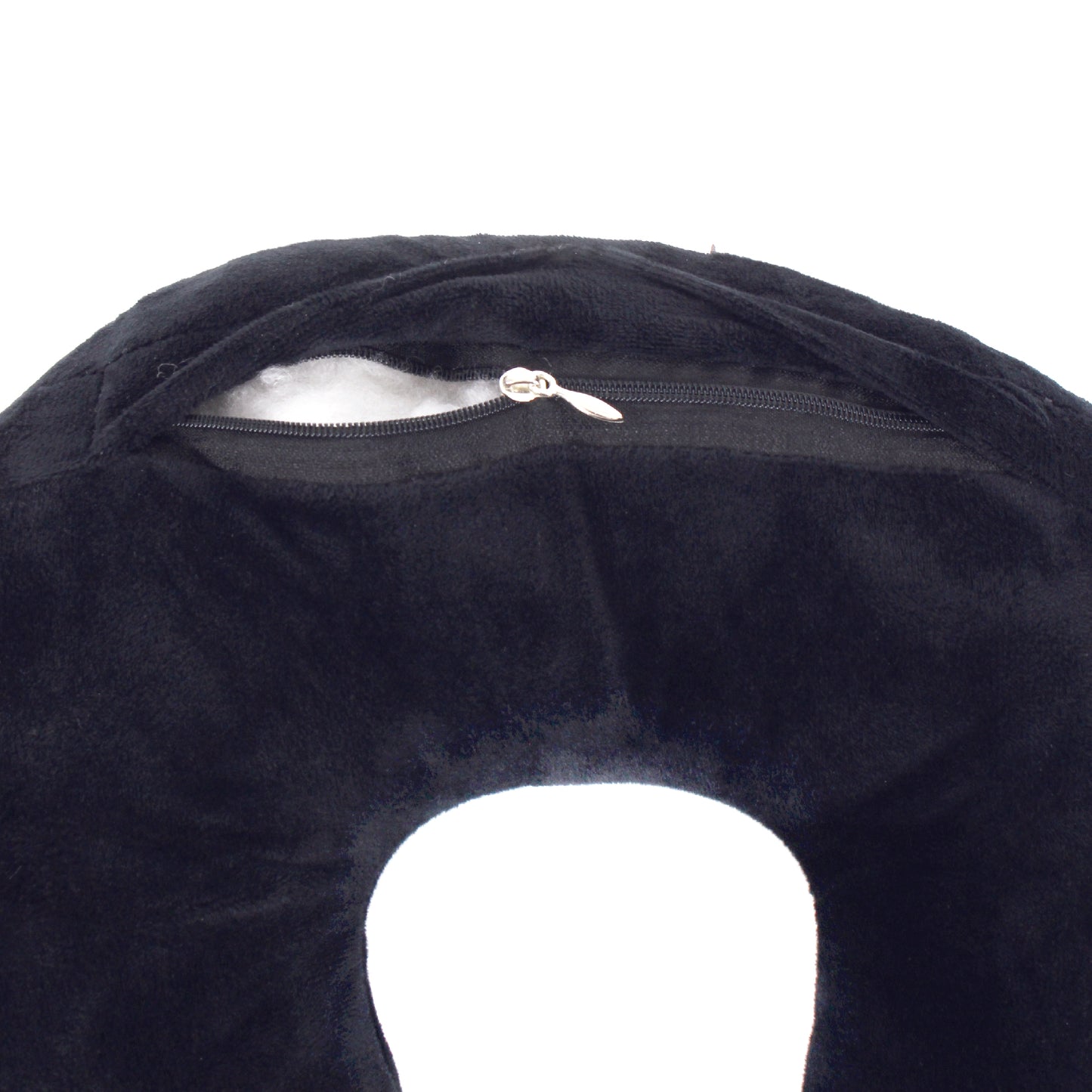 Close up view of the zipper opening on the Plush Travel Neck Pillow in Black, which is exposing the plush interior inside the pillow's cover.