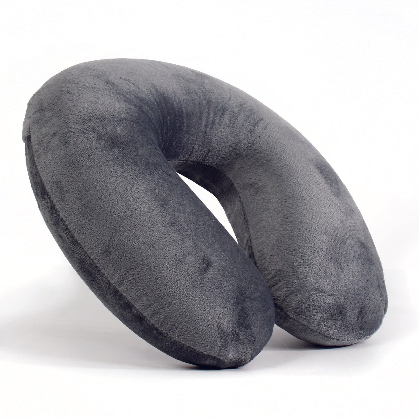 Side view of the Plush Travel Neck Pillow in Gray, which is made of ultra-soft light gray fabric.
