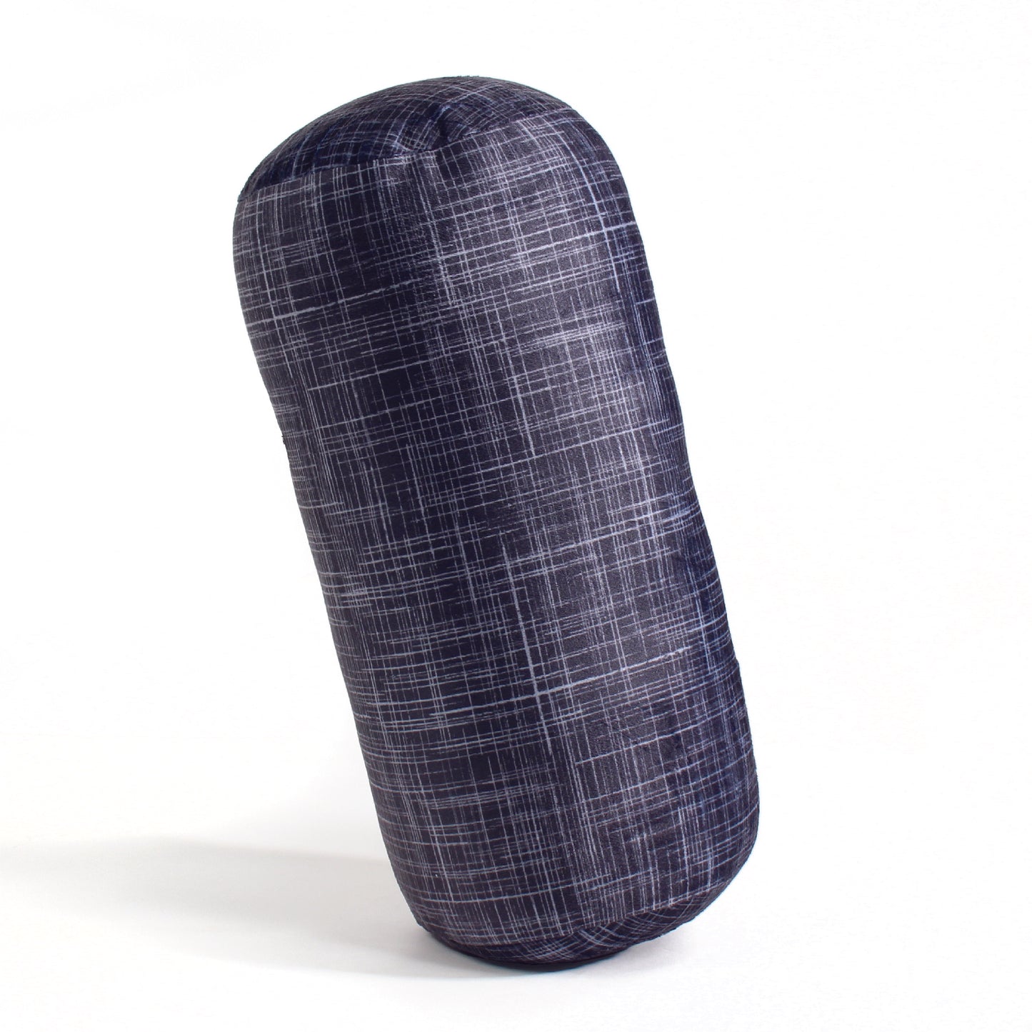 Side view of the Plush Roll Travel Pillow in Black Hatch, which is made of ultra-soft black, gray, and white cross-hatch fabric.