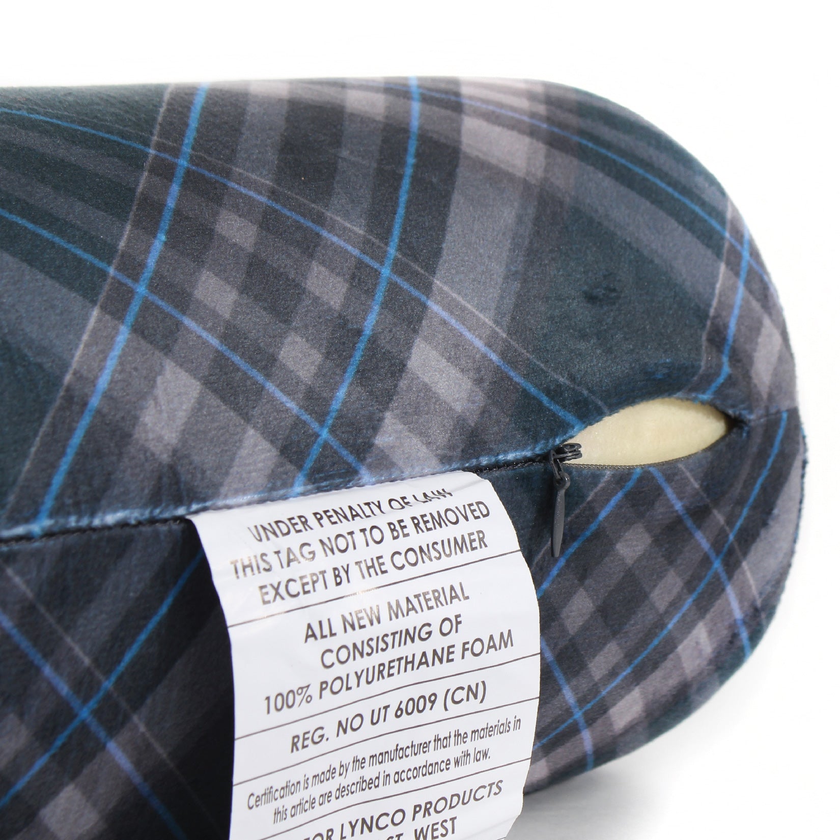 Close up view of the zipper opening on the Memory Foam Roll Travel Pillow in Navy Plaid, which is exposing the plush interior inside the pillow's cover.