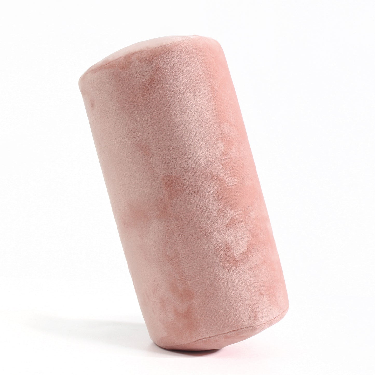 Side view of the Memory Foam Roll Travel Pillow in Pink, which is made of ultra-soft light pink fabric.