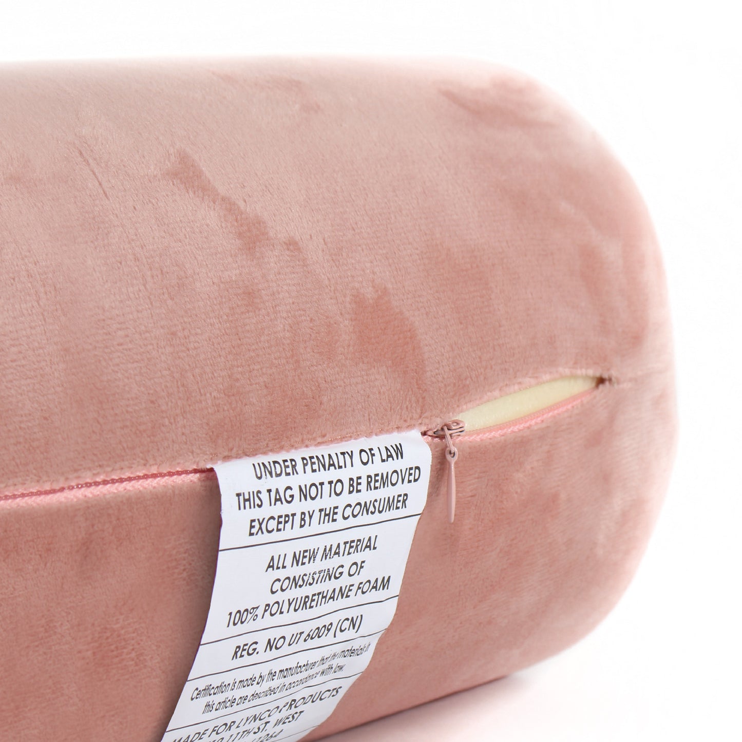 Close up view of the zipper opening on the Memory Foam Roll Travel Pillow in Pink, which is exposing the plush interior inside the pillow's cover.