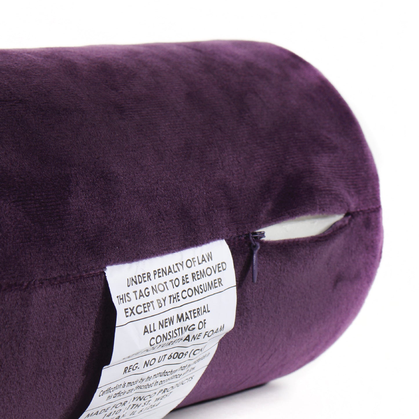 Close up view of the zipper opening on the Memory Foam Roll Travel Pillow in Purple, which is exposing the plush interior inside the pillow's cover.