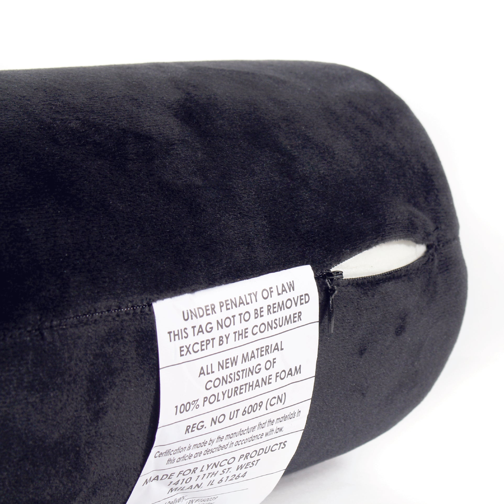 Close up view of the zipper opening on the Memory Foam Roll Travel Pillow in Black, which is exposing the plush interior inside the pillow's cover.