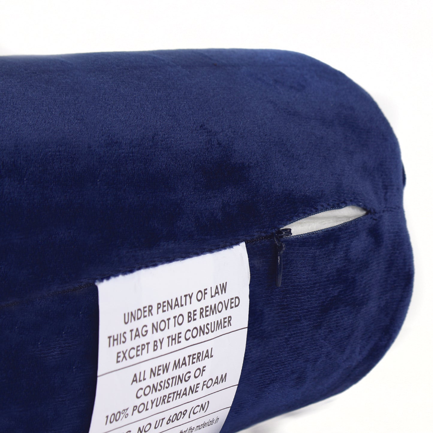 Close up view of the zipper opening on the Memory Foam Roll Travel Pillow in Navy, which is exposing the plush interior inside the pillow's cover.