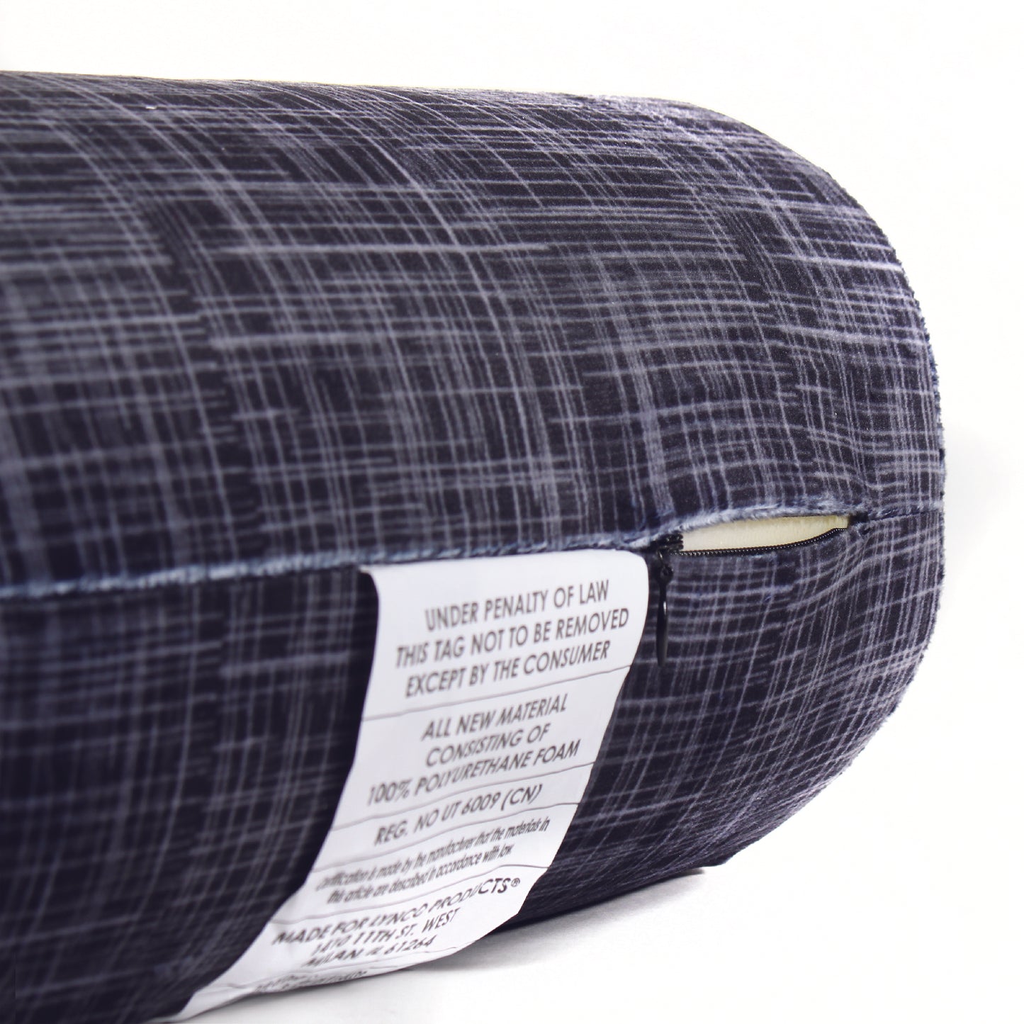 Close up view of the zipper opening on the Memory Foam Roll Travel Pillow in Black Hatch, which is exposing the plush interior inside the pillow's cover.