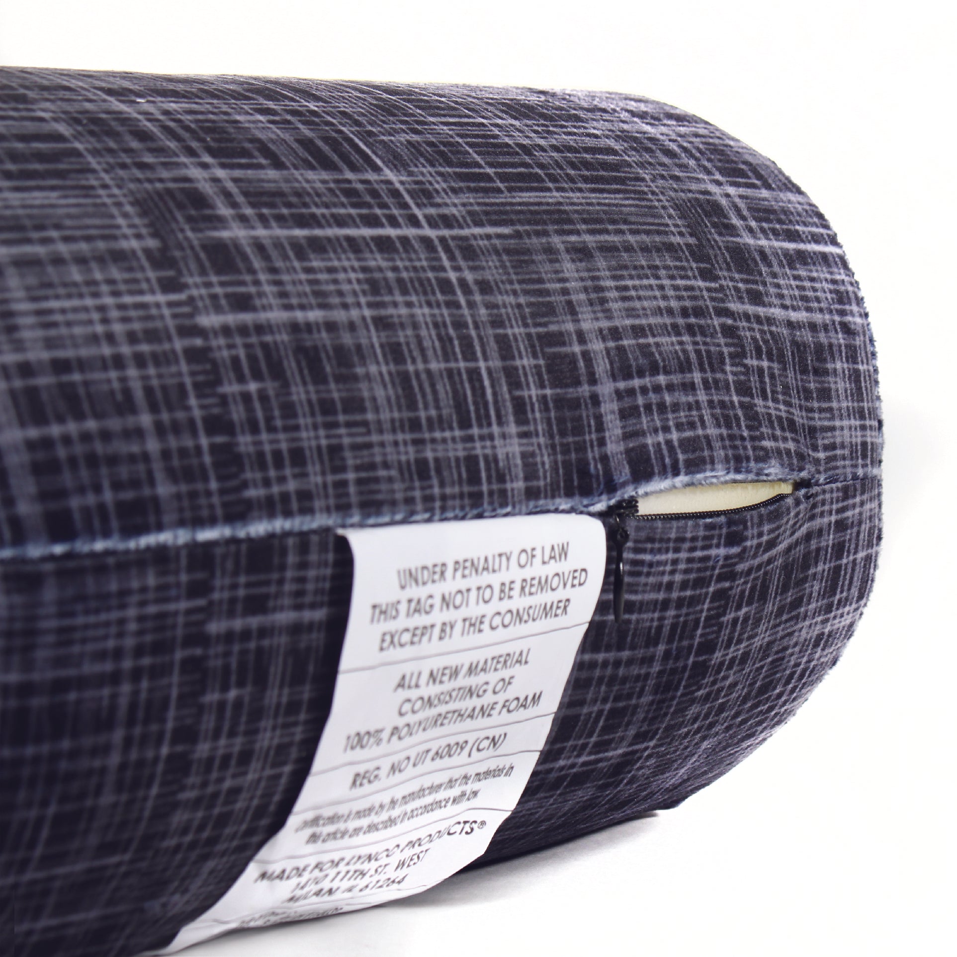Close up view of the zipper opening on the Memory Foam Roll Travel Pillow in Black Hatch, which is exposing the plush interior inside the pillow's cover.