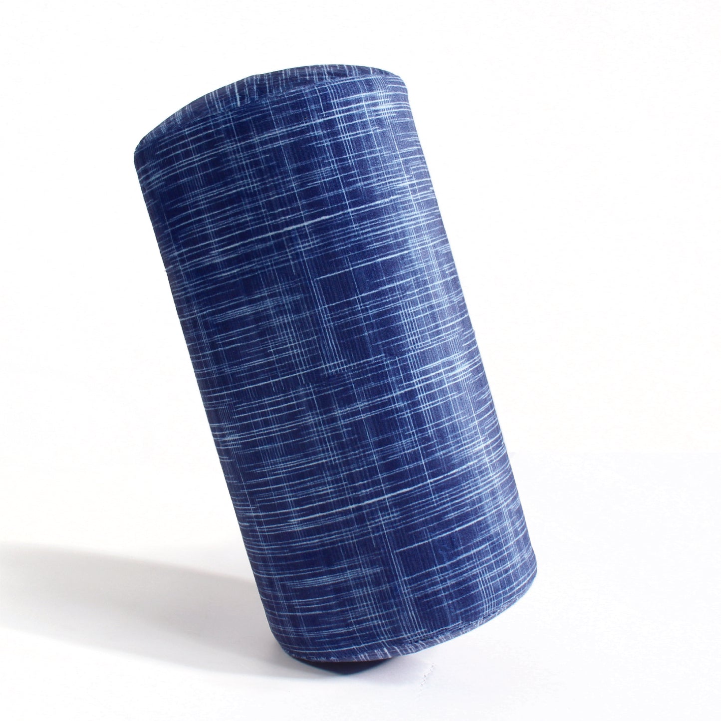 Side view of the Memory Foam Roll Travel Pillow in Navy Hatch, which is made of ultra-soft navy, blue, and white cross-hatch fabric.