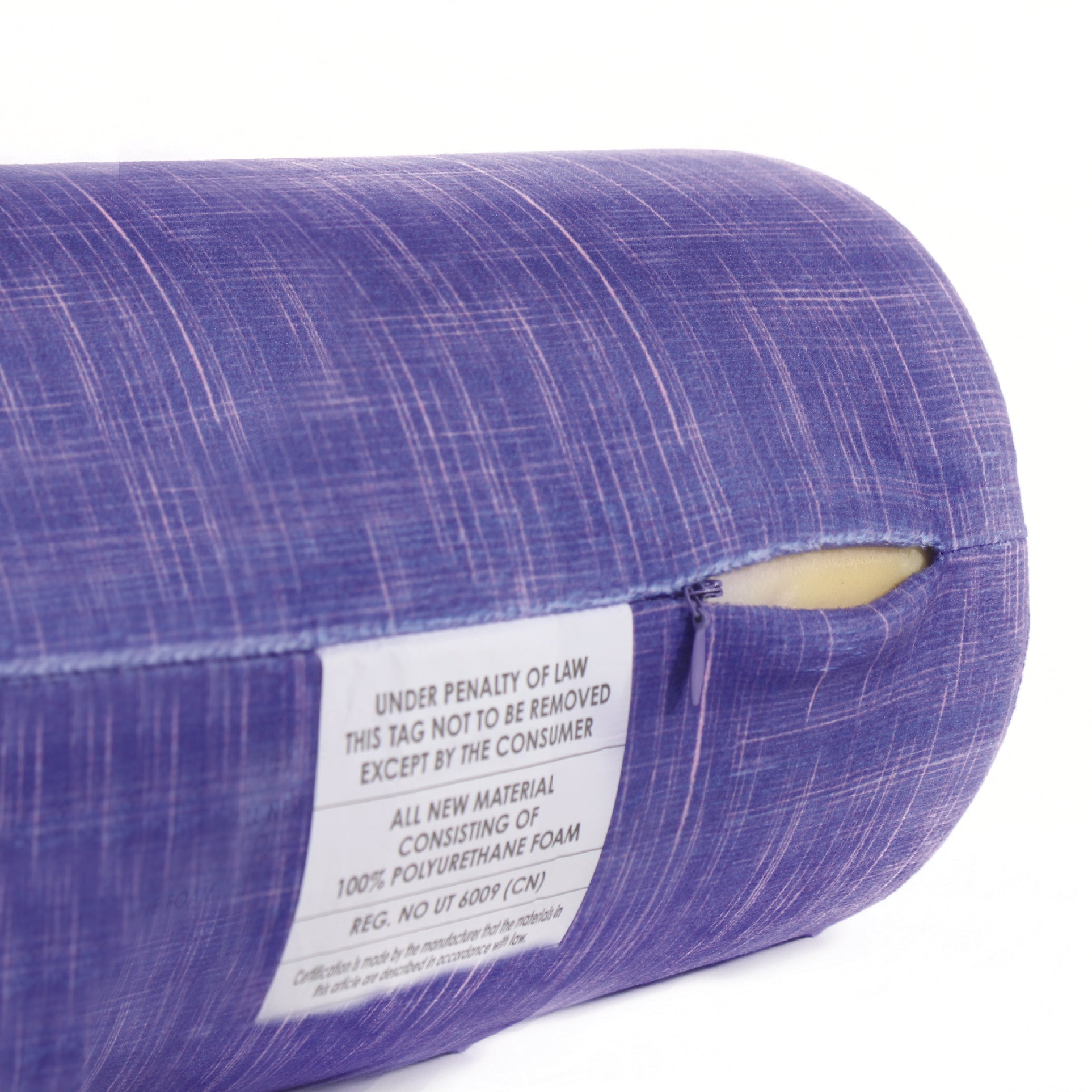 Close up view of the zipper opening on the Memory Foam Roll Travel Pillow in UV Hatch, which is exposing the plush interior inside the pillow's cover.