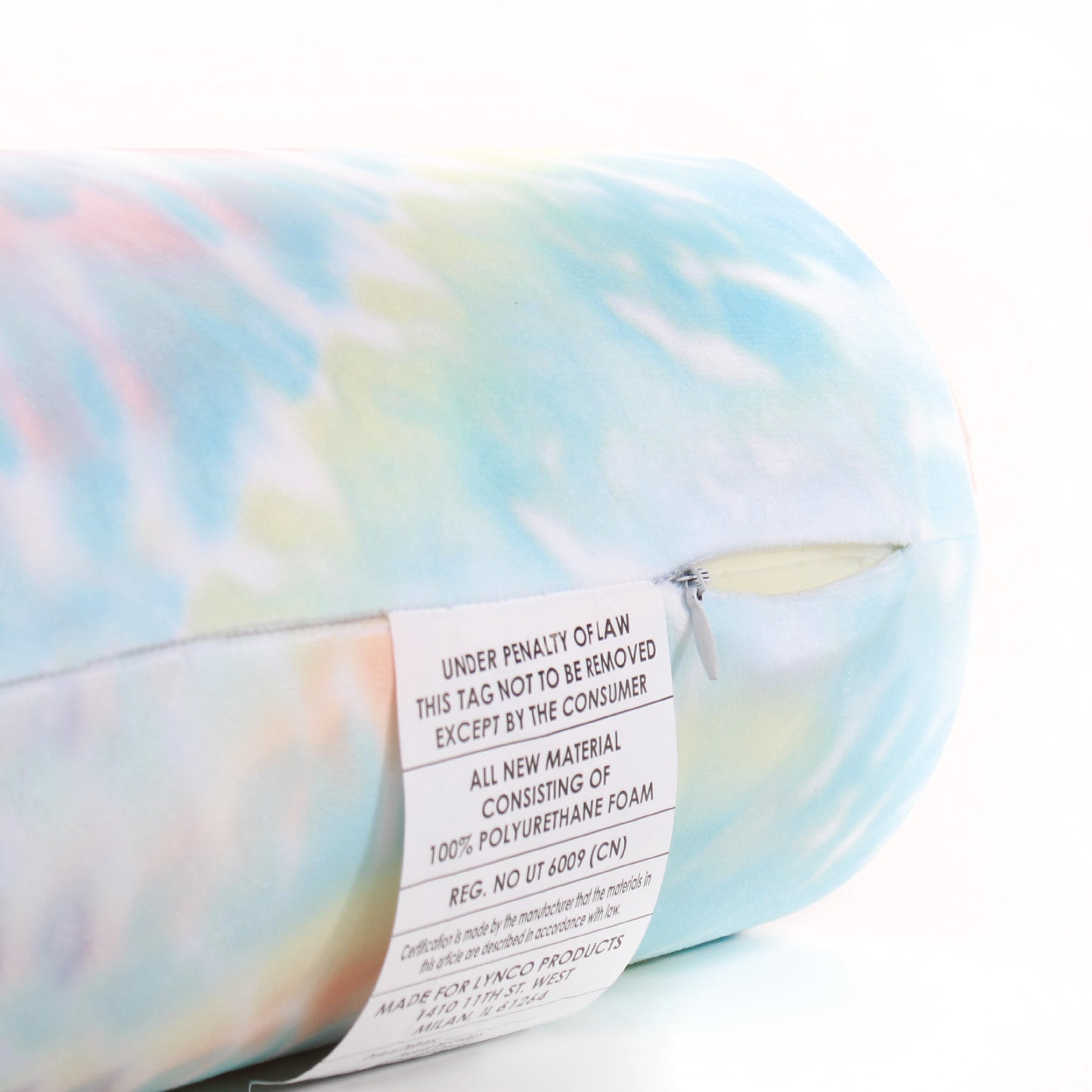 Close up view of the zipper opening on the Memory Foam Roll Travel Pillow in Multicolor Tie Dye, which is exposing the plush interior inside the pillow's cover.