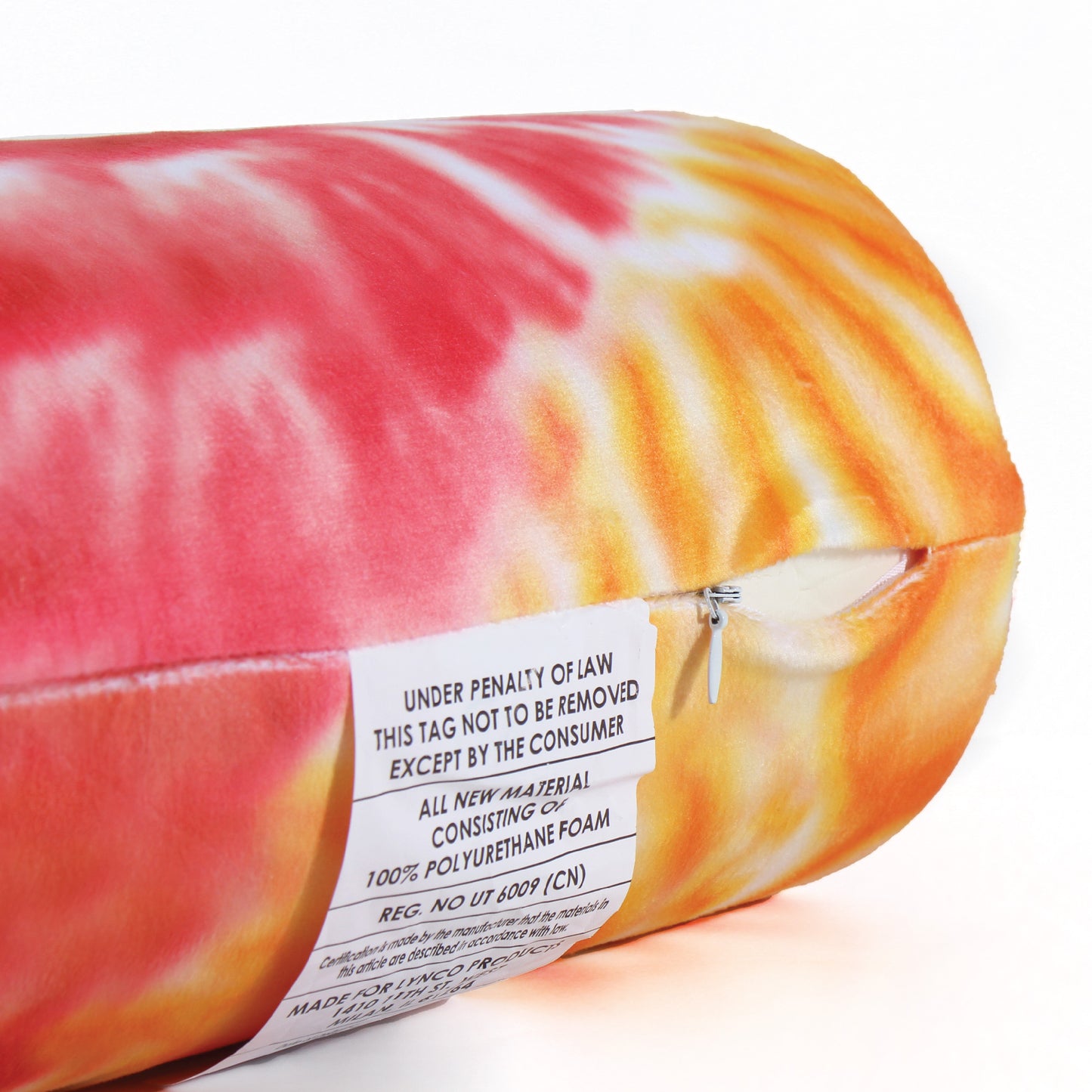 Close up view of the zipper opening on the Memory Foam Roll Travel Pillow in Red and Yellow Tie Dye, which is exposing the plush interior inside the pillow's cover.