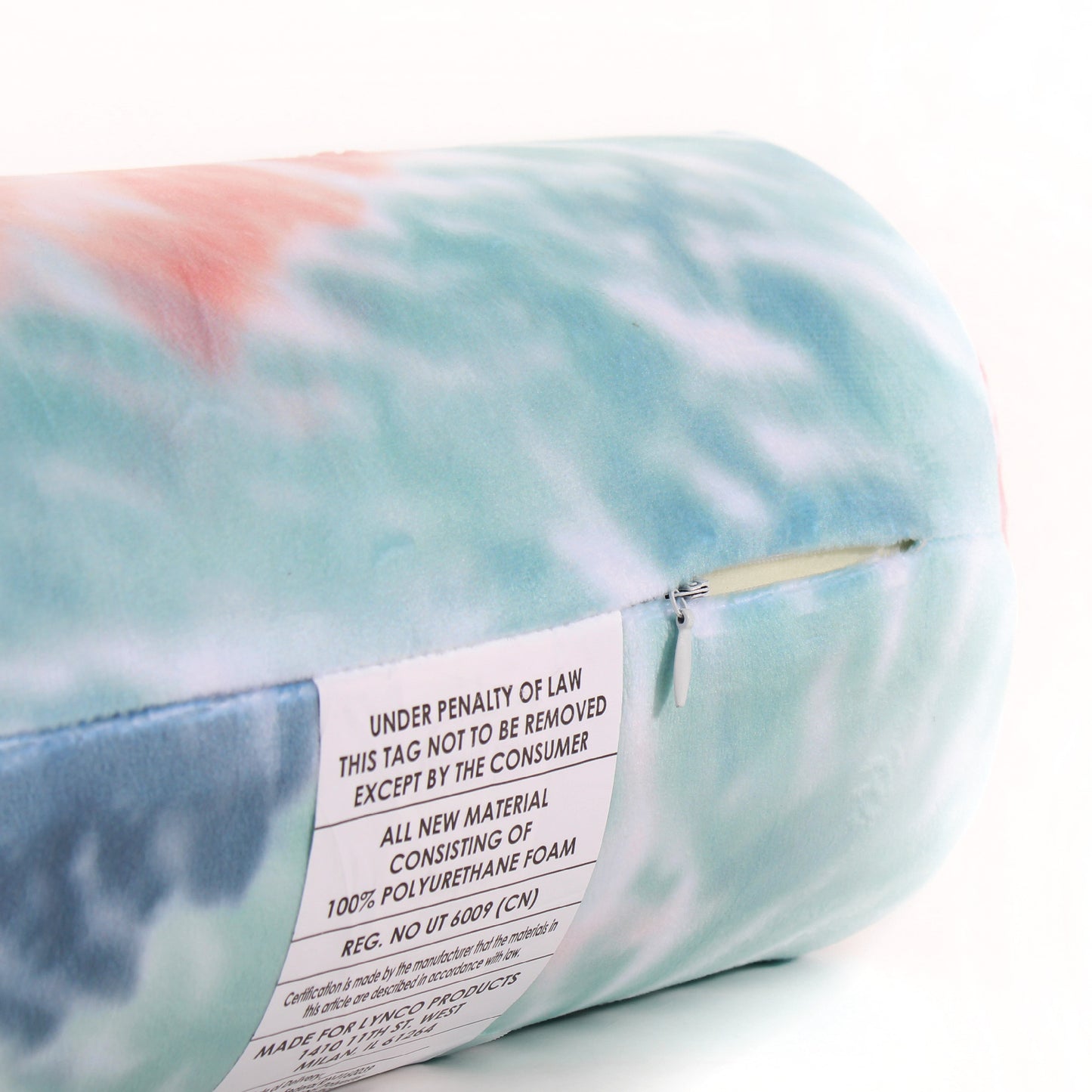 Close up view of the zipper opening on the Memory Foam Roll Travel Pillow in Peach and Gray Tie Dye, which is exposing the plush interior inside the pillow's cover.