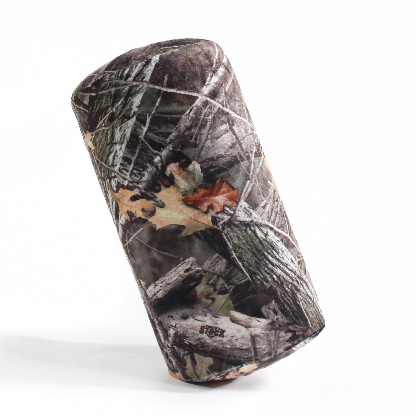 Side view of the Memory Foam Roll Travel Pillow in Hunter's Stock Oneshot® Camo, which is made of ultra-soft brown, tan, green, and gray camo fabric.