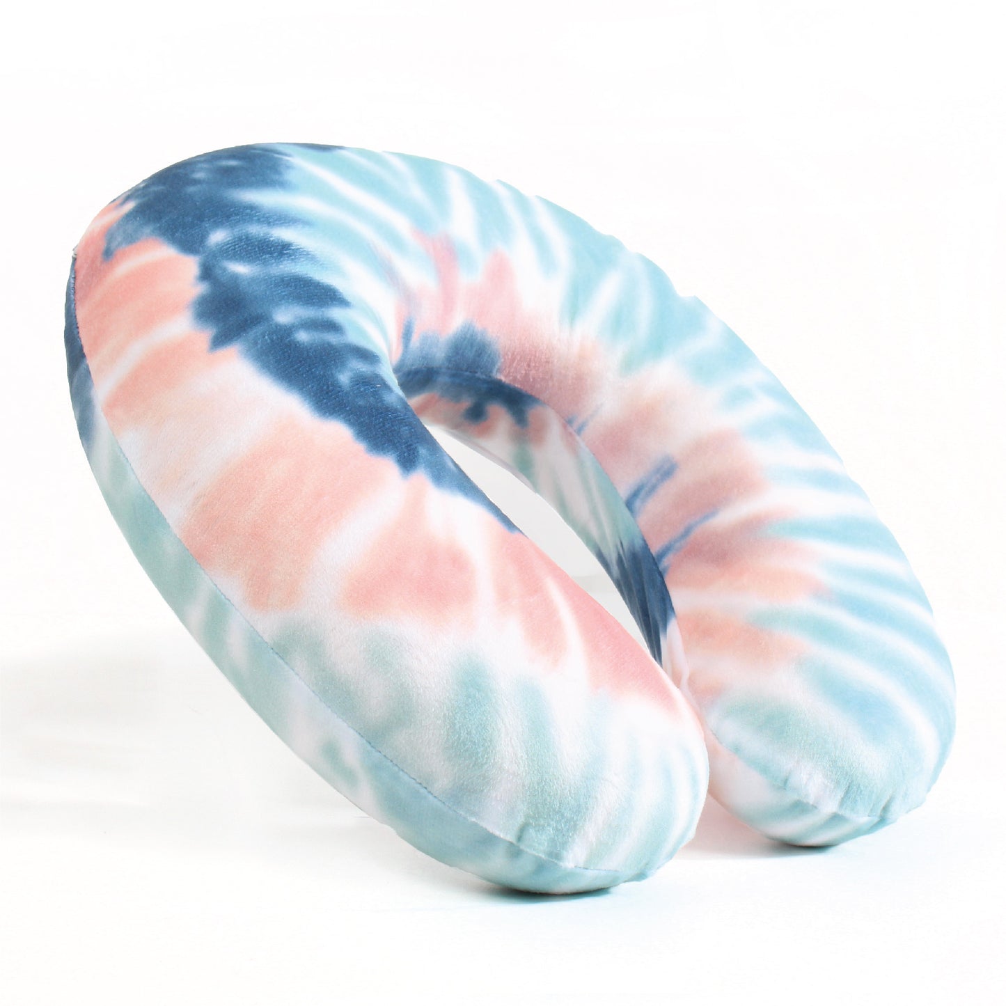 Side view of the Memory Foam Travel Neck Pillow in Peach and Gray Tie Dye, which is made of ultra-soft pink, gray, blue, teal, and white tie dye fabric.