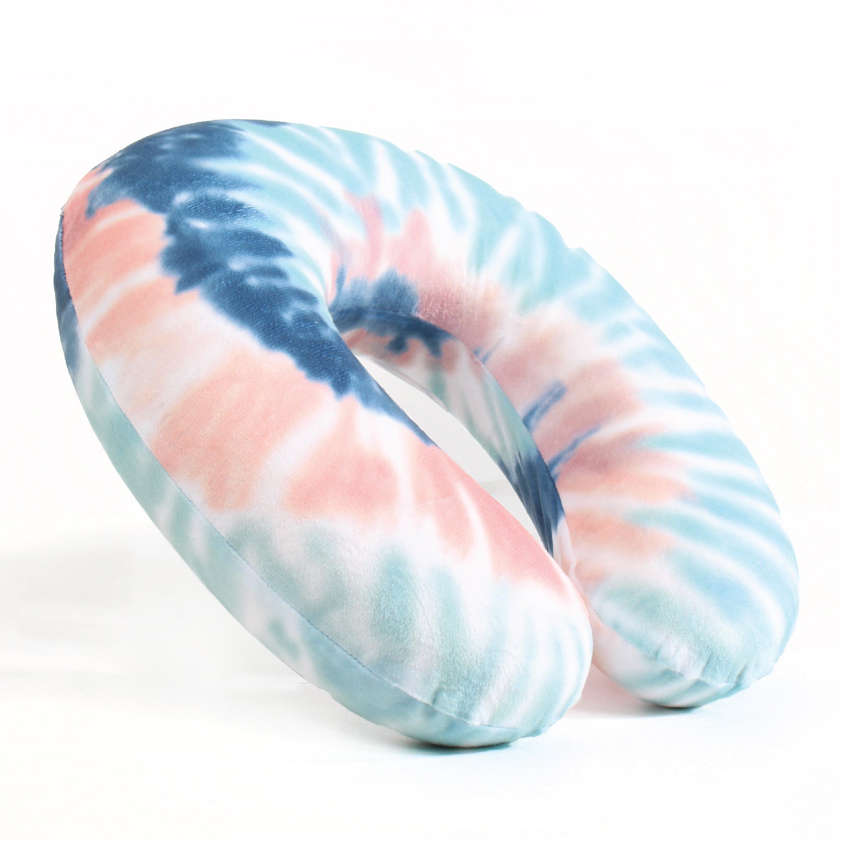 Side view of the Memory Foam Travel Neck Pillow in Peach and Gray Tie Dye, which is made of ultra-soft pink, gray, blue, teal, and white tie dye fabric.