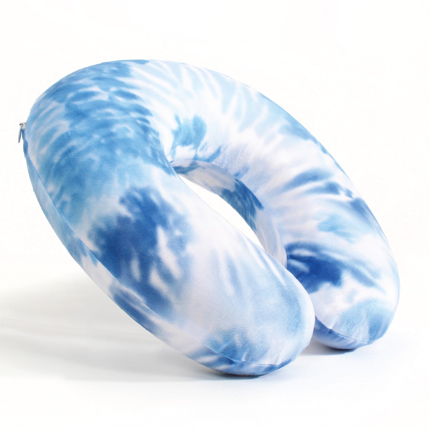 Side view of the Memory Foam Travel Neck Pillow in Sky Blue Tie Dye, which is made of ultra-soft blue, light blue, and white tie dye fabric.