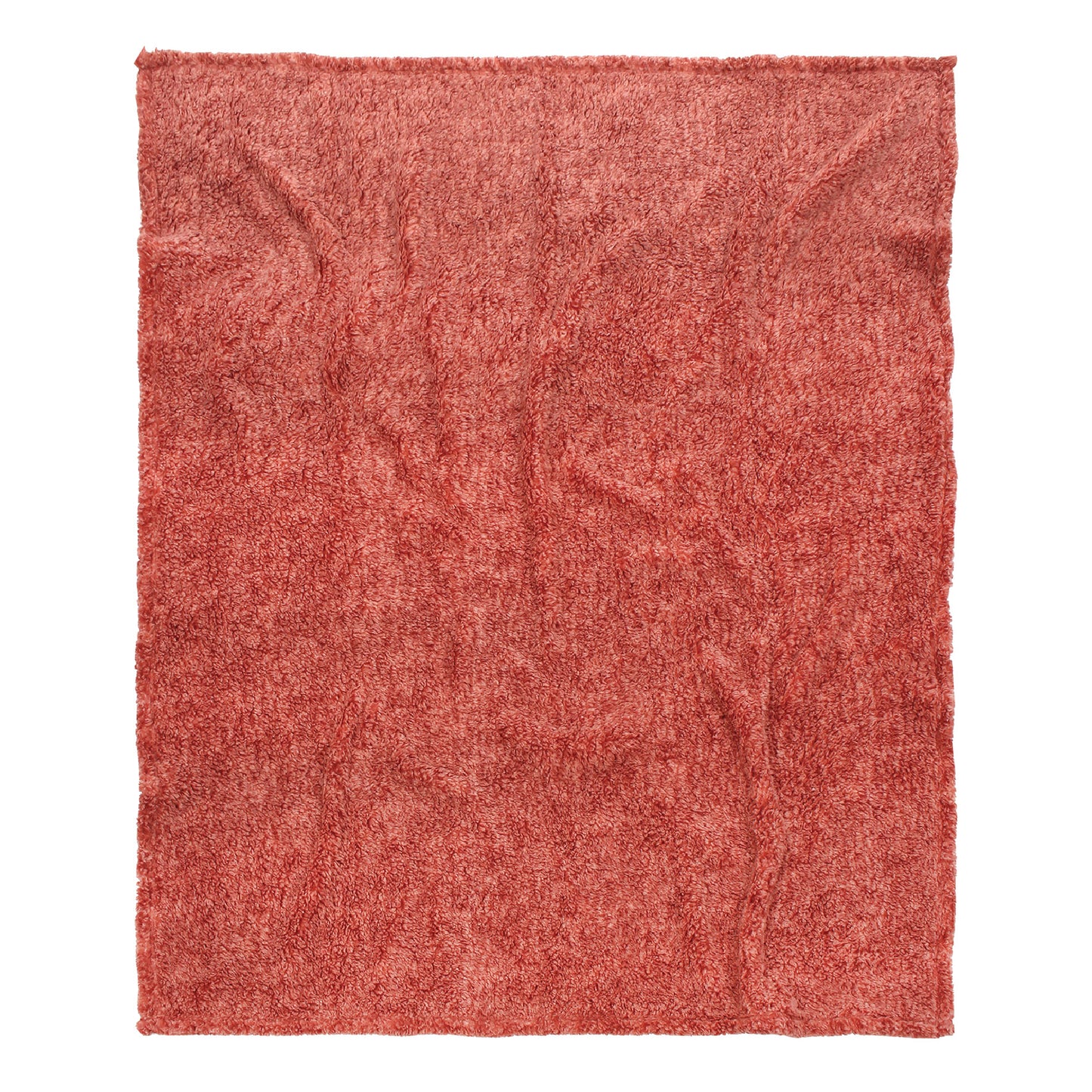 A view of the coral blanket unfolded featuring a textured, rectangular design on a white background.