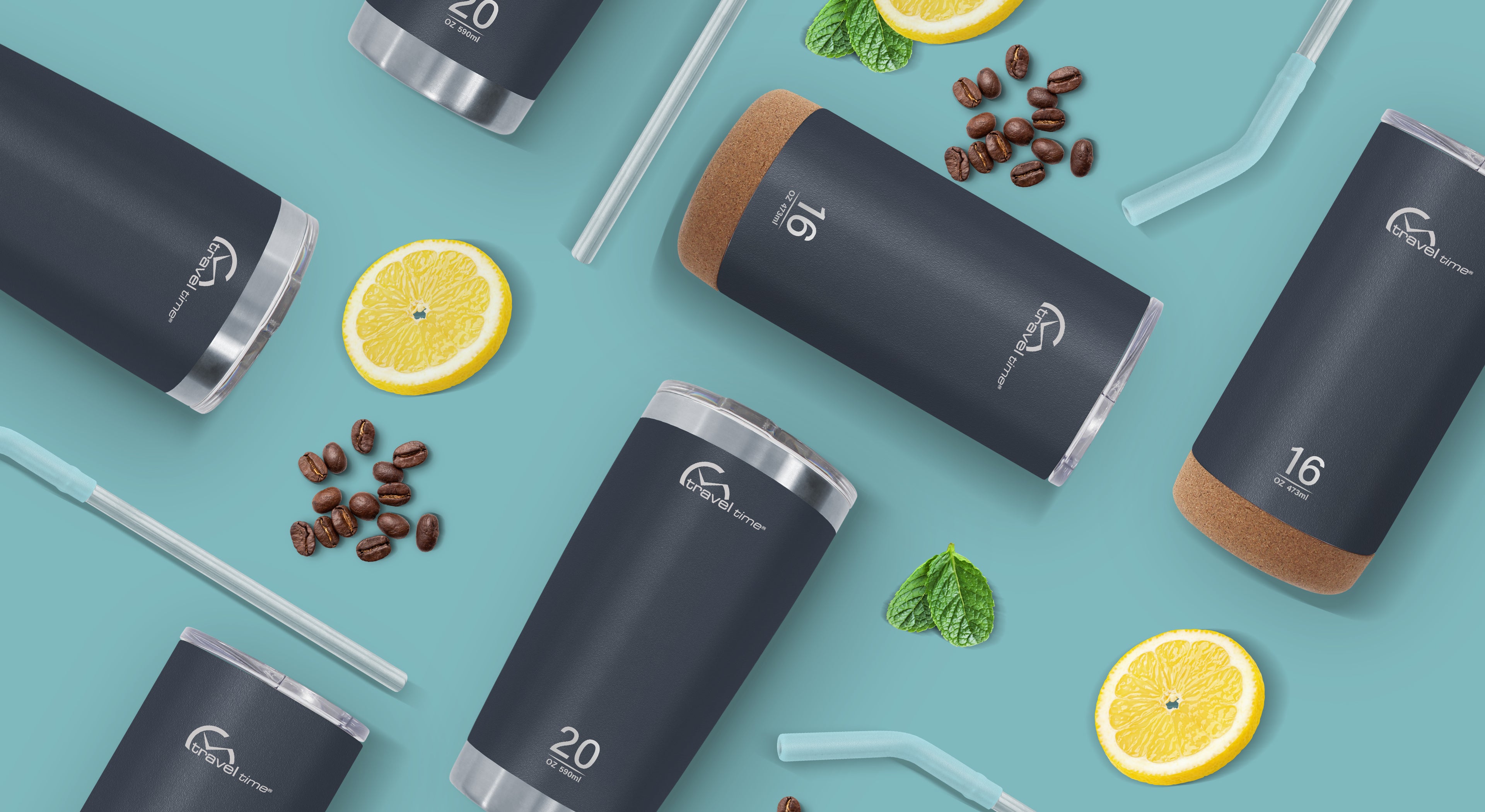 Flat lay of navy travel tumblers with 'travel time' logo displayed on a teal background. The tumblers vary in size (16 oz and 20 oz) with some featuring cork bottoms. Scattered around are reusable straws, lemon slices, coffee beans, and mint leaves