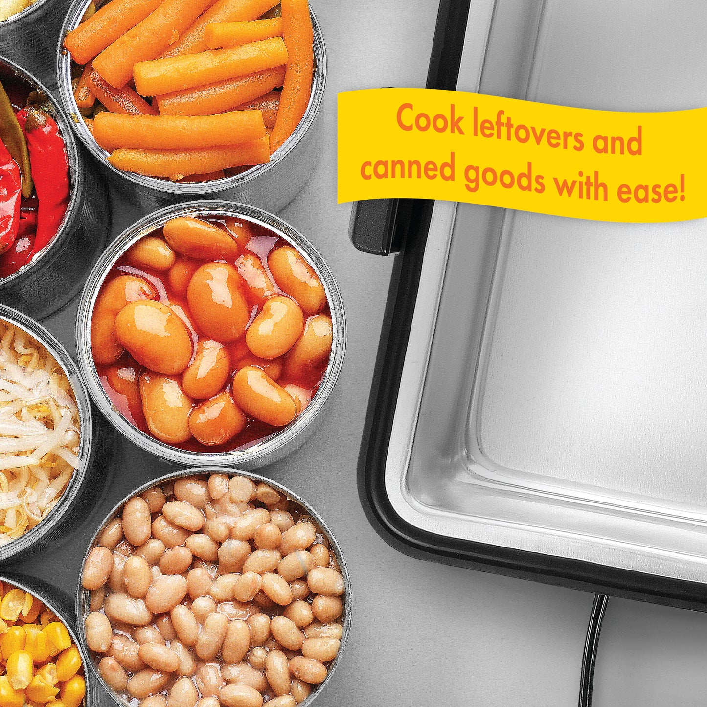 Close up of the interior of the 12V Portable Stove's interior sitting next to cans of food and leftovers.