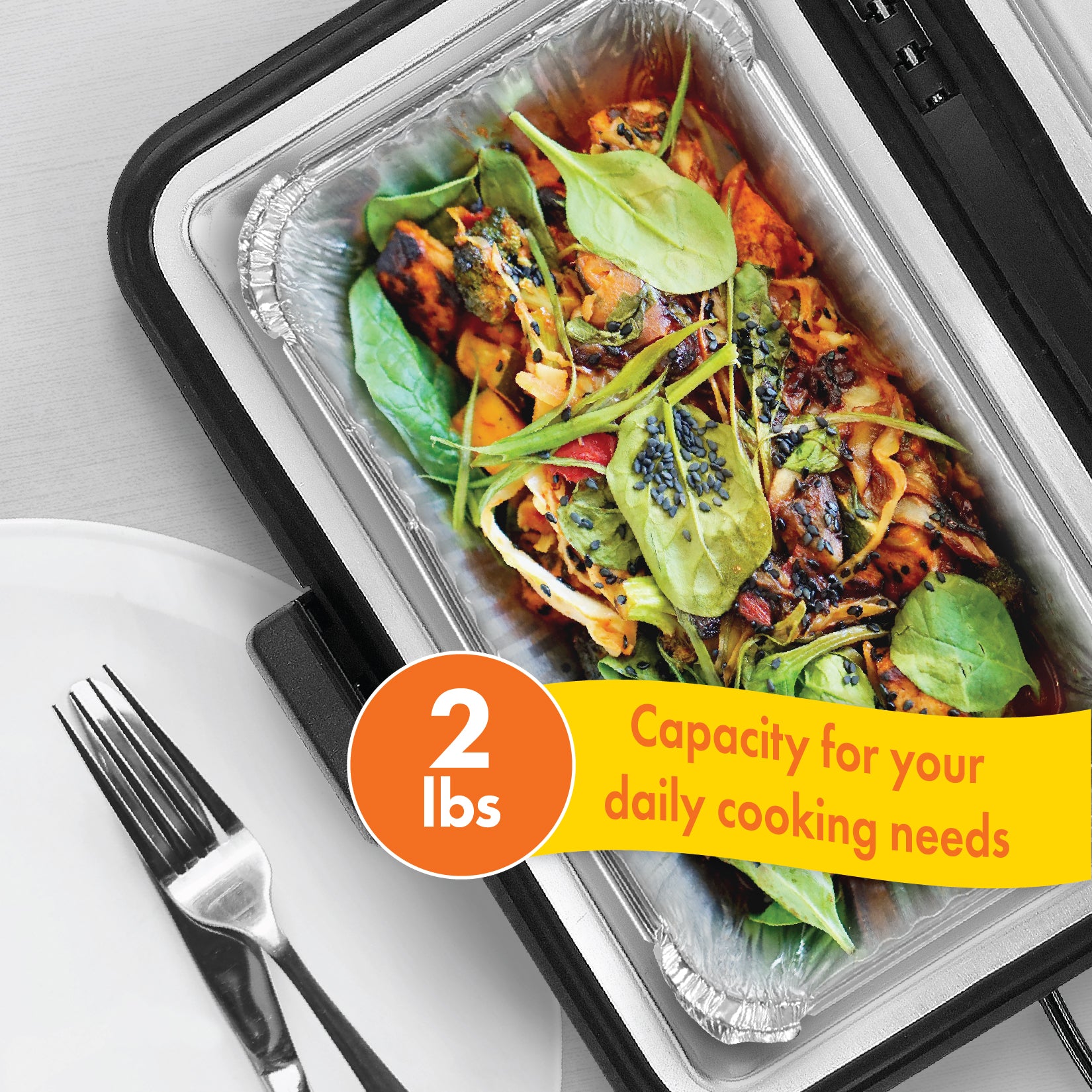 A foil container inserted in the Travel Time Portable Stove filled with warm food and a callout that the containers can hold up to 2lbs of food.